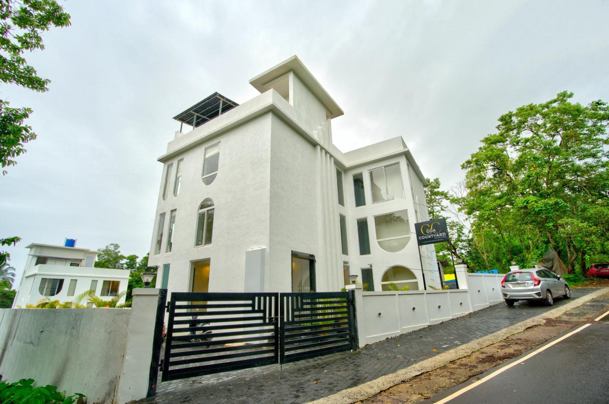 Goa Courtyard By The Porto Arpora Hotel Baga Exterior photo