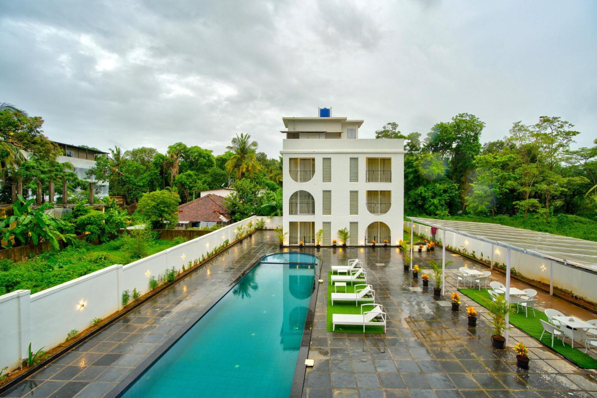 Goa Courtyard By The Porto Arpora Hotel Baga Exterior photo