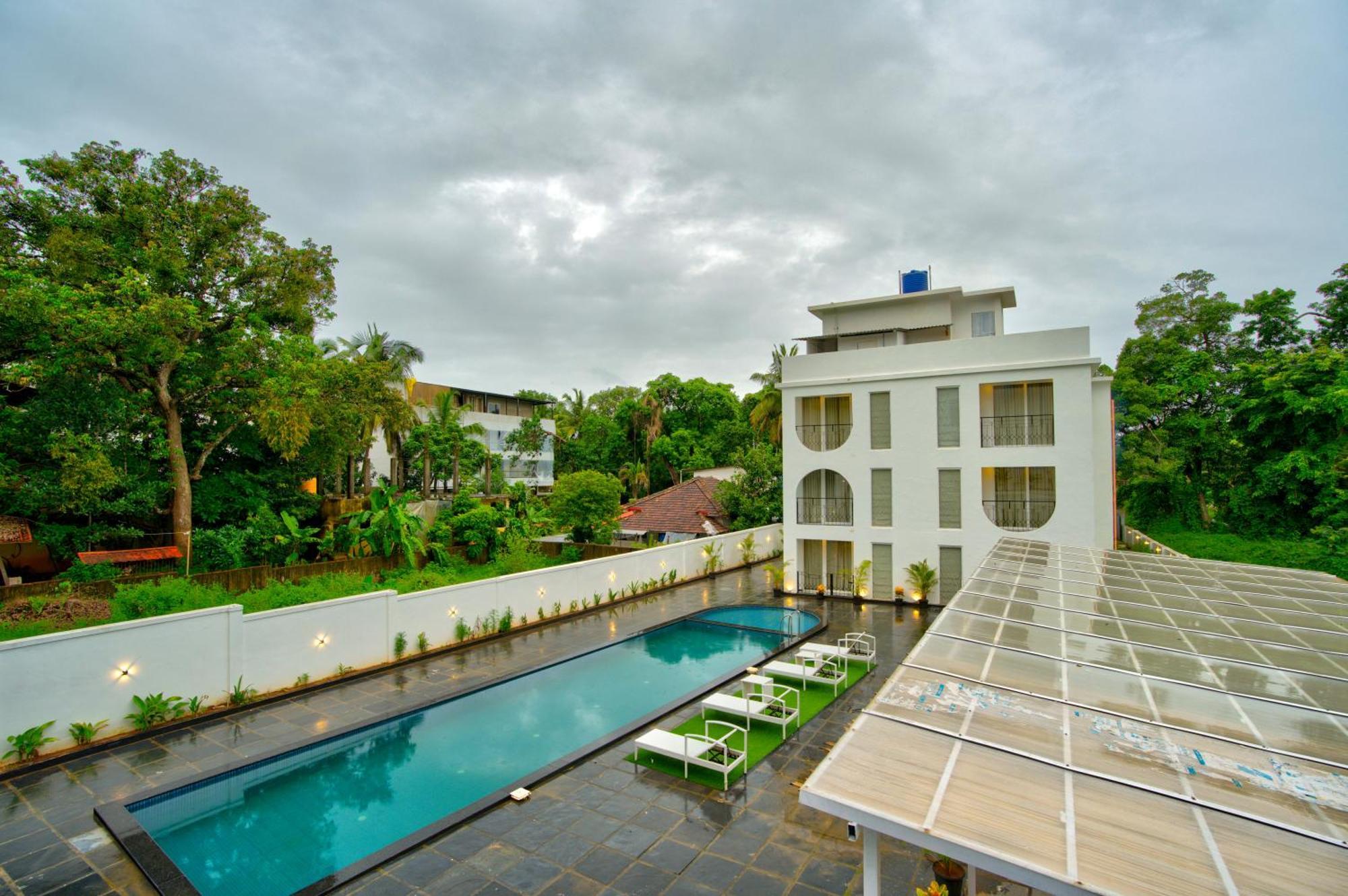 Goa Courtyard By The Porto Arpora Hotel Baga Exterior photo