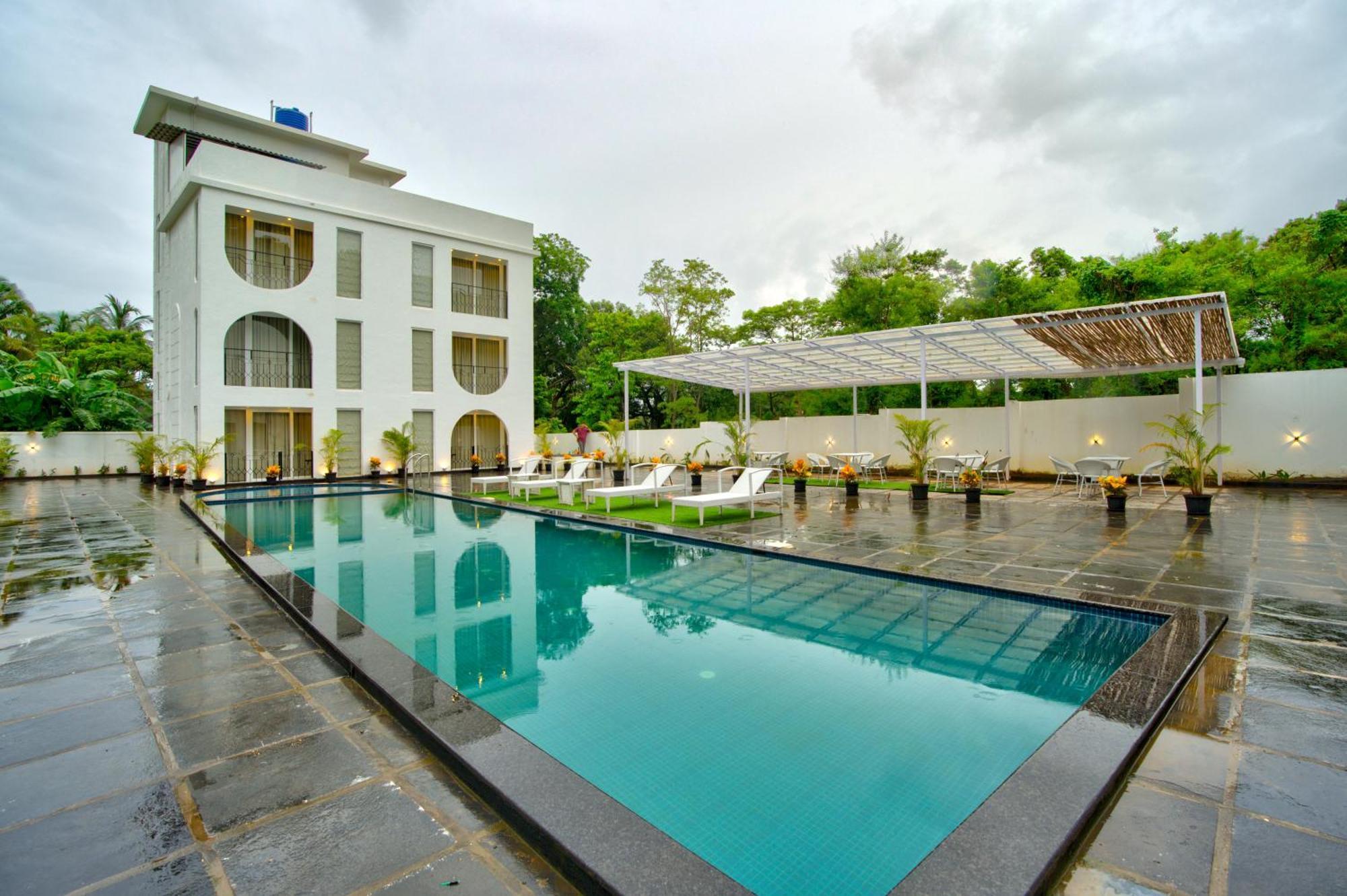Goa Courtyard By The Porto Arpora Hotel Baga Exterior photo