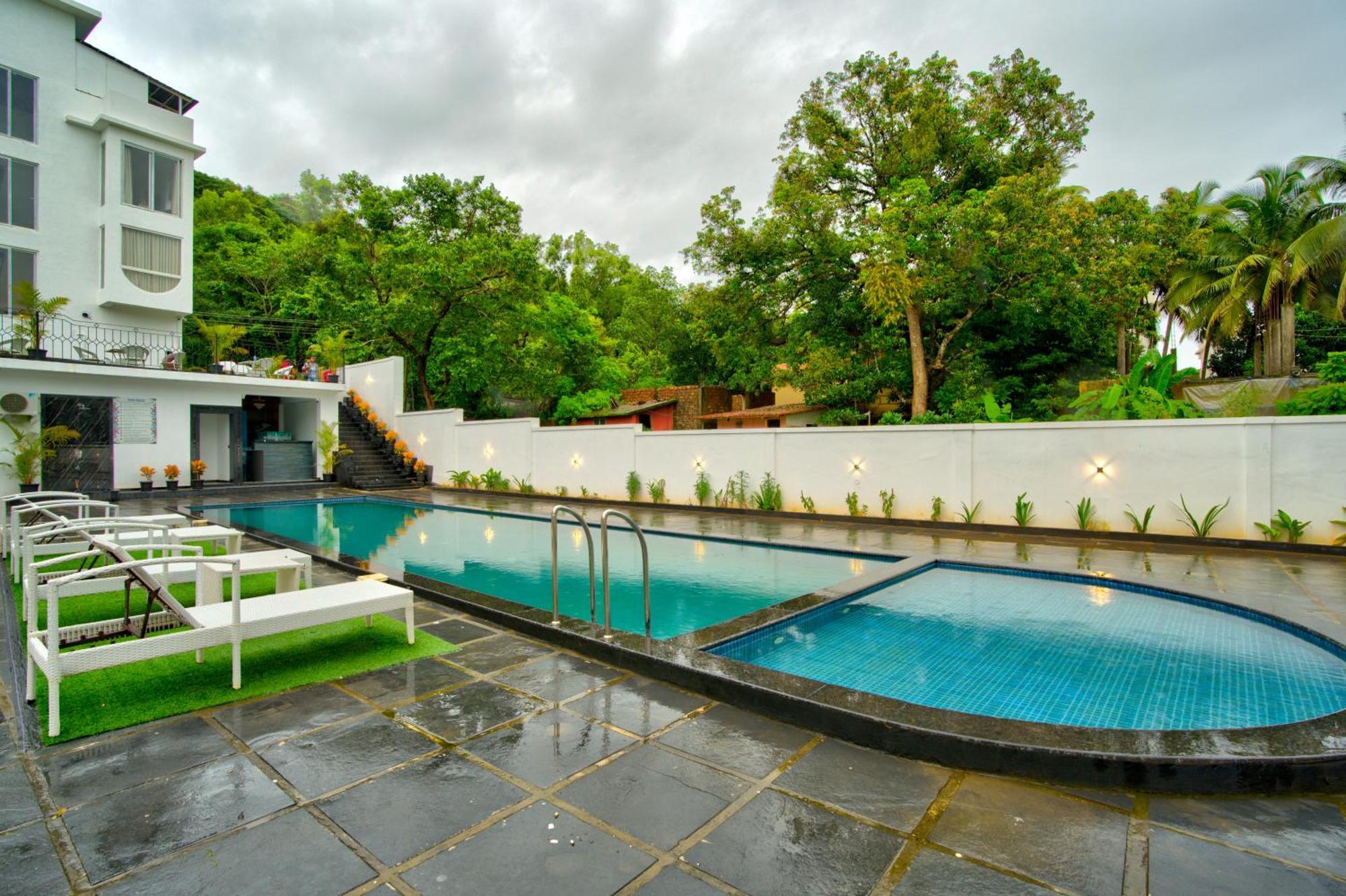 Goa Courtyard By The Porto Arpora Hotel Baga Exterior photo
