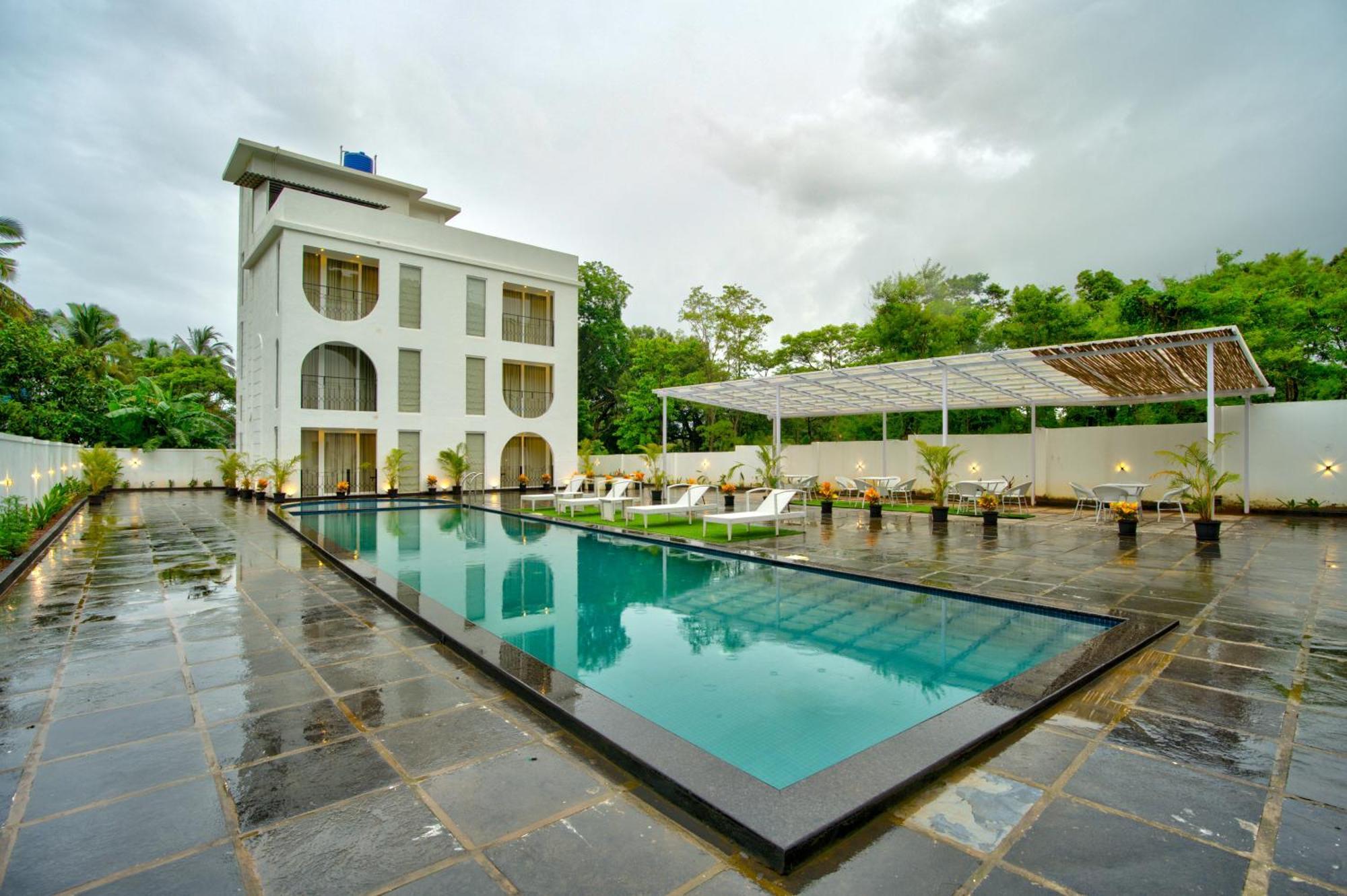 Goa Courtyard By The Porto Arpora Hotel Baga Exterior photo