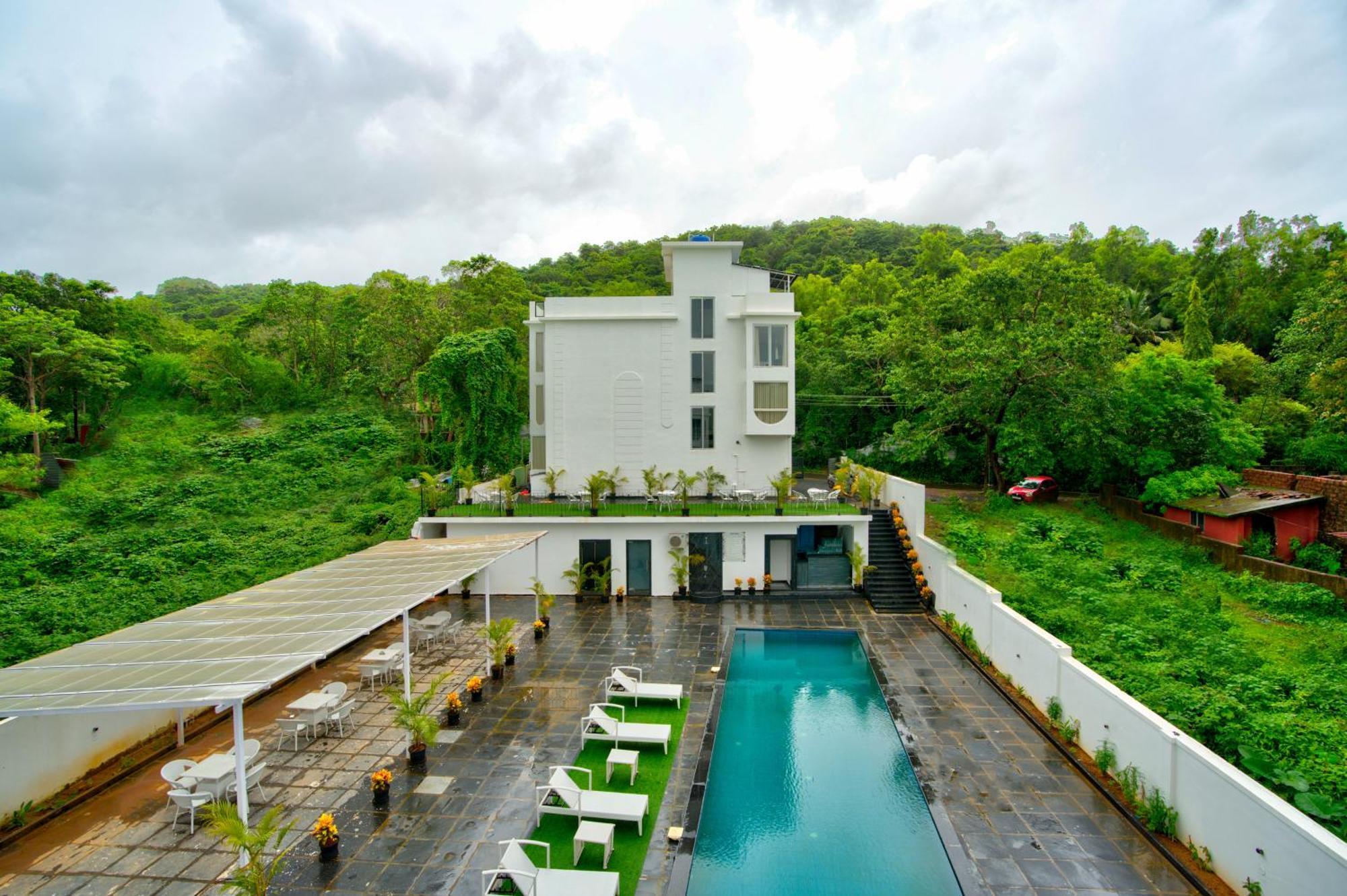 Goa Courtyard By The Porto Arpora Hotel Baga Exterior photo